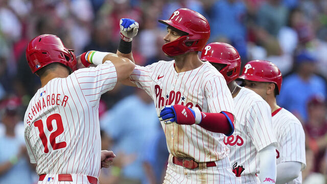 PHILADELPHIA, PENNSYLVANIA - JULY 9: Trea Turner #7 of the Philadelphia Phillies celebrates with Kyle Schwarber #12 after hitting a grand slam in the bottom of the fourth inning against the Los Angeles Dodgers at Citizens Bank Park on July 9, 2024 in Philadelphia, Pennsylvania.