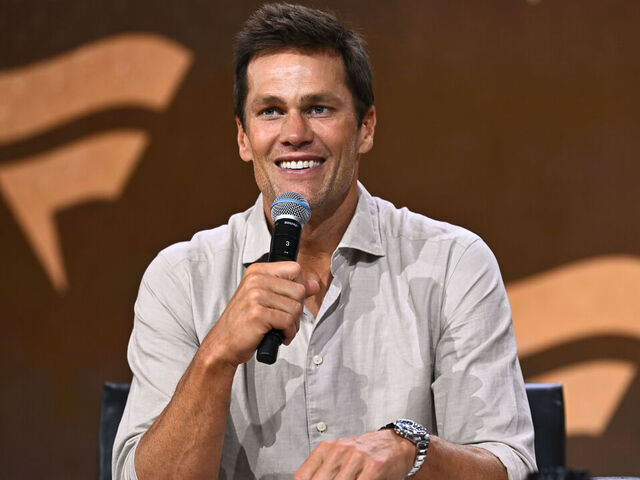 NEW YORK, NEW YORK - AUGUST 16: Tom Brady speaks at the Fanatics Fest NYC 2024 at Jacob Javits Center on August 16, 2024 in New York City.