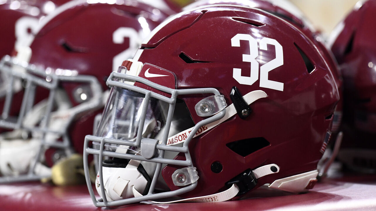 INDIANAPOLIS, IN - JANUARY 10: Alabama Crimson Tide helmets sit on the sideline at the conclusion of the Alabama Crimson Tide versus the Georgia Bulldogs in the College Football Playoff National Championship, on January 10, 2022, at Lucas Oil Stadium in Indianapolis, IN.
