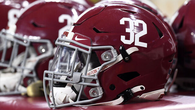 INDIANAPOLIS, IN - JANUARY 10: Alabama Crimson Tide helmets sit on the sideline at the conclusion of the Alabama Crimson Tide versus the Georgia Bulldogs in the College Football Playoff National Championship, on January 10, 2022, at Lucas Oil Stadium in Indianapolis, IN.