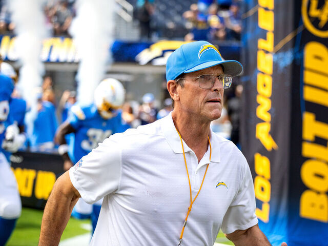 Inglewood, CA - August 17: Chargers head coach Jim Harbaugh and the team take the field for a preseason game against the Rams at SoFi Stadium in Inglewood Saturday, Aug. 17, 2024. (Allen J. Schaben / Los Angeles Times via Getty Images)