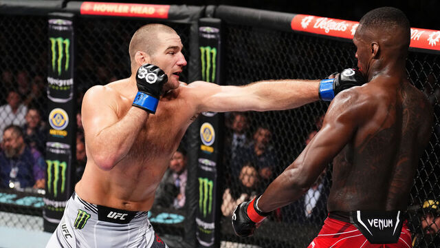 SYDNEY, AUSTRALIA - SEPTEMBER 10: (L-R) Sean Strickland punches Israel Adesanya of Nigeria in the UFC middleweight championship fight during the UFC 293 event at Qudos Bank Arena on September 10, 2023 in Sydney, Australia.
