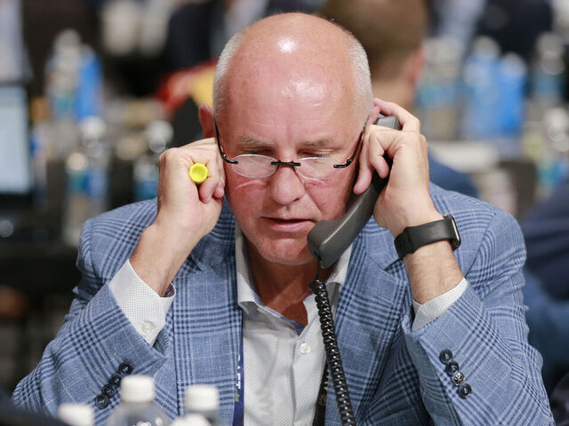 NASHVILLE, TENNESSEE - JUNE 29: General manager Doug Armstrong of the St. Louis Blues talks on his phone during the 2023 Upper Deck NHL Draft - Rounds 2-7 at Bridgestone Arena on June 29, 2023 in Nashville, Tennessee.