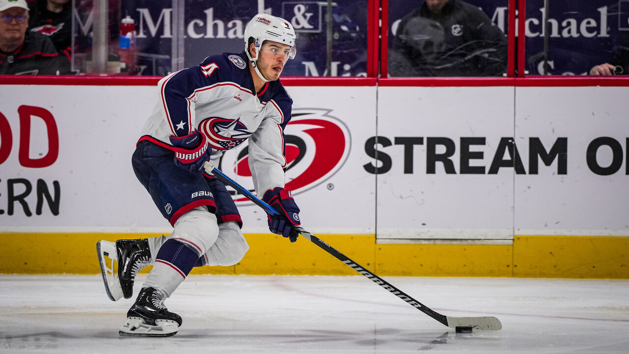 RALEIGH, NORTH CAROLINA - APRIL 07: Cole Sillinger #4 of the Columbus Blue Jackets skates during the second period against the Carolina Hurricanes at PNC Arena on April 7, 2024 in Raleigh, North Carolina.