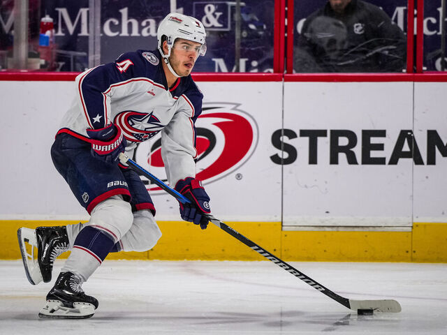 RALEIGH, NORTH CAROLINA - APRIL 07: Cole Sillinger #4 of the Columbus Blue Jackets skates during the second period against the Carolina Hurricanes at PNC Arena on April 7, 2024 in Raleigh, North Carolina.