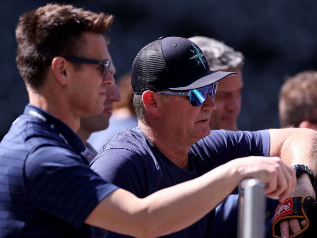 SEATTLE, WASHINGTON - JULY 18: General manager Jerry Dipoto of the Seattle Mariners watches batting practice with manager Scott Servais #9 at T-Mobile Park on July 18, 2023 in Seattle, Washington.