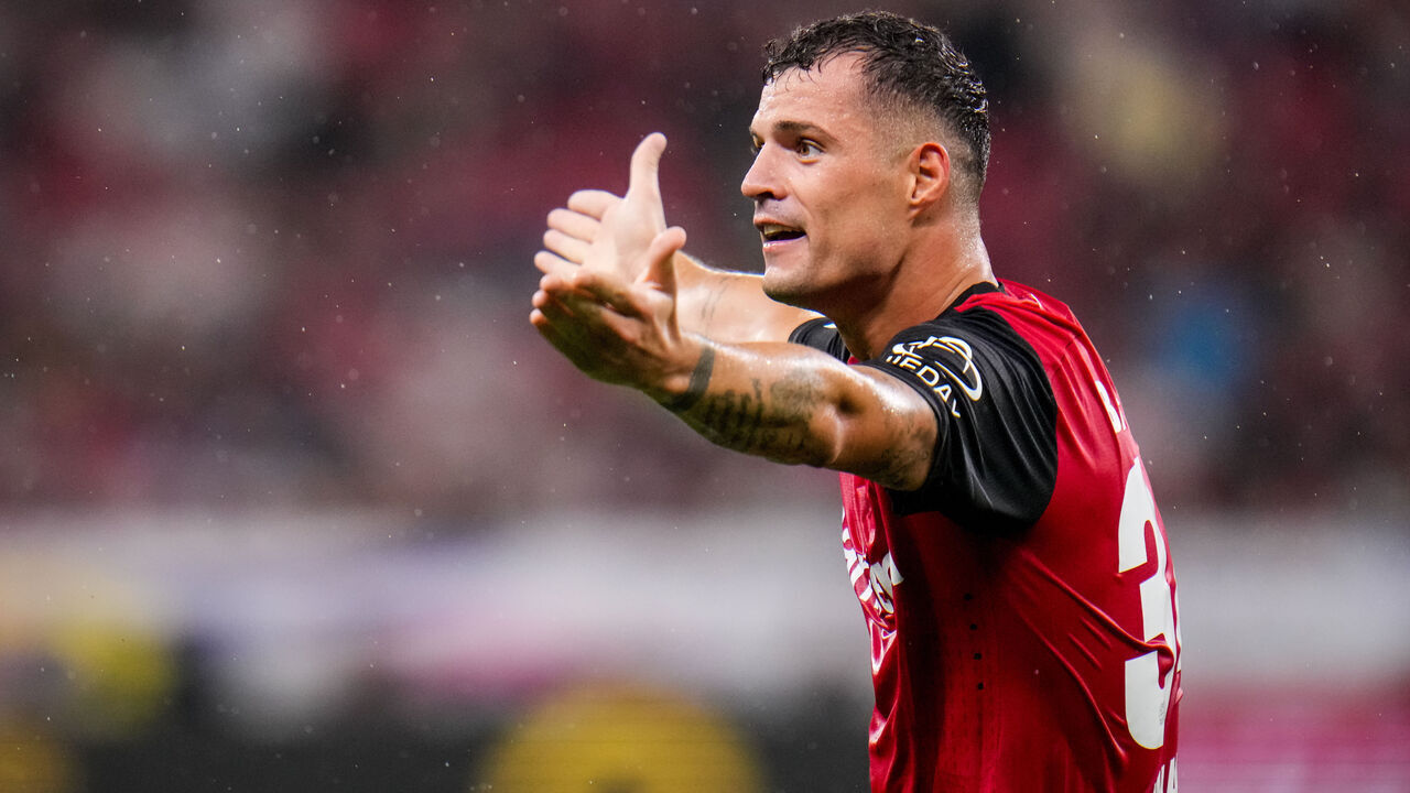 LEVERKUSEN, GERMANY - AUGUST 17: Granit Xhaka of Bayer 04 Leverkusen reacts during the DFL Supercup 2024 match between Bayer 04 Leverkusen and VfB Stuttgart at BayArena on August 17, 2024 in Leverkusen, Germany.