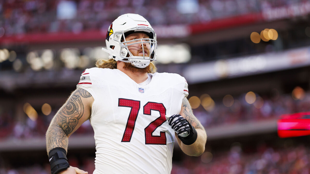GLENDALE, ARIZONA - DECEMBER 17: Hjalte Froholdt #72 of the Arizona Cardinals runs onto the field during player introductions before an NFL football game against the San Francisco 49ers at State Farm Stadium on December 17, 2023 in Glendale, Arizona.