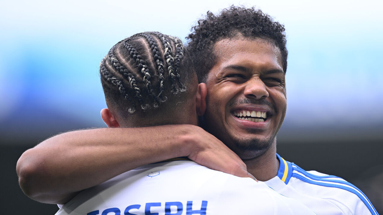 LEEDS, ENGLAND - AUGUST 03: Mateo Joseph of Leeds United celebrates with Georginio Rutter after scoring the first Leeds goal during the friendly match between Leeds United and Valencia at Elland Road on August 03, 2024 in Leeds, England.