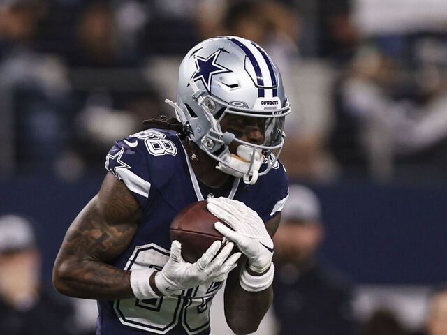 ARLINGTON, TX - DECEMBER 30: CeeDee Lamb #88 of the Dallas Cowboys runs with the ball during an NFL football game against the Detroit Lions at AT&T Stadium on December 30, 2023 in Arlington, Texas.