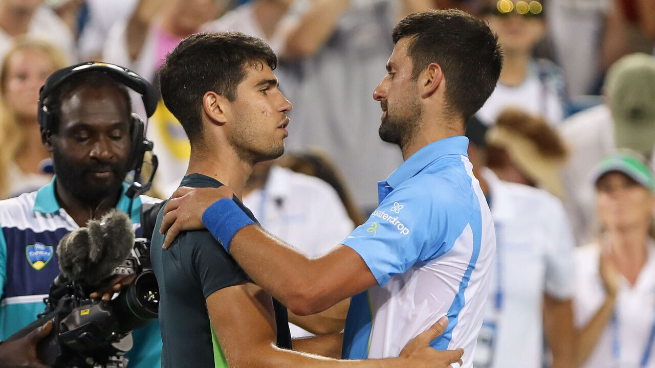 CINCINNATI, OH - AUGUST 20: Carlos Alcaraz of Spain shakes hands with Novak Djokovic of Serbia after the final round at the Western & Southern Open at Lindner Family Tennis Center on August 20, 2023 in Mason, Ohio. Djokovic defeated Alcaraz 5-7, 7-6, 7-6.