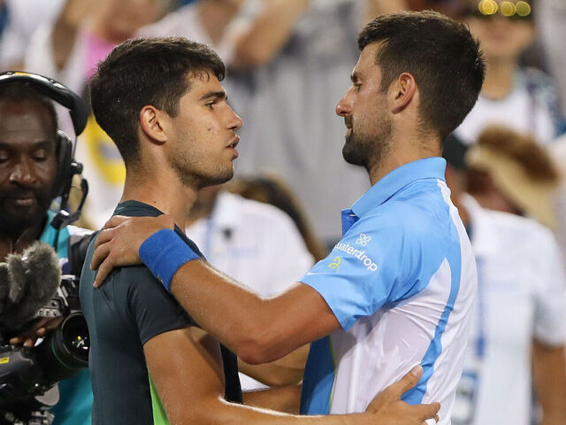 CINCINNATI, OH - AUGUST 20: Carlos Alcaraz of Spain shakes hands with Novak Djokovic of Serbia after the final round at the Western & Southern Open at Lindner Family Tennis Center on August 20, 2023 in Mason, Ohio. Djokovic defeated Alcaraz 5-7, 7-6, 7-6.