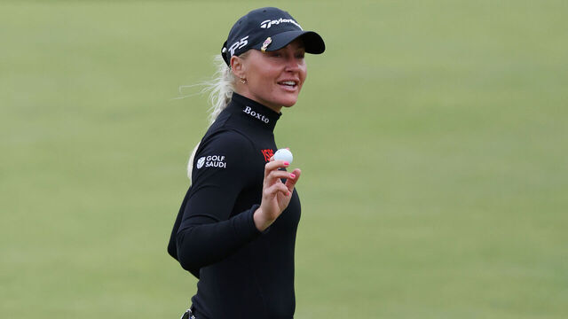 ST ANDREWS, SCOTLAND - AUGUST 22: Charley Hull of England reacts to her birdie on the 18th green during Day One of the AIG Women's Open at St Andrews Old Course on August 22, 2024 in St Andrews, Scotland.