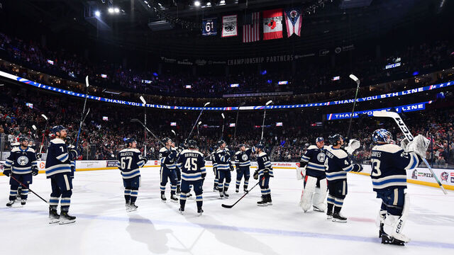 COLUMBUS, OHIO - APRIL 16: The Columbus Blue Jackets salute the fans after defeating the Carolina Hurricanes 6-3 in their season finale at Nationwide Arena on April 16, 2024 in Columbus, Ohio.
