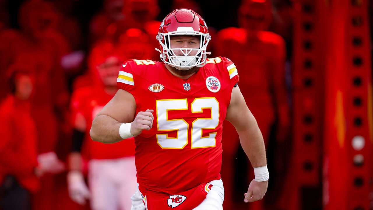 KANSAS CITY, MISSOURI - DECEMBER 10: Creed Humphrey #52 of the Kansas City Chiefs runs onto the field during introductions prior to the game against the Buffalo Bills at GEHA Field at Arrowhead Stadium on December 10, 2023 in Kansas City, Missouri.