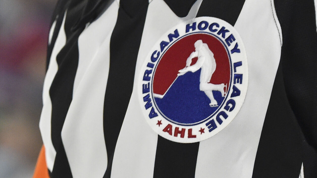 LAVAL, QC - OCTOBER 15: A close-up detail of the AHL logo seen on a referee jersey during the third period between the Belleville Senators and the Laval Rocket at Place Bell on October 15, 2021 in Montreal, Canada. The Laval Rocket defeated the Belleville Senators 6-2.