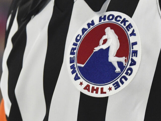 LAVAL, QC - OCTOBER 15: A close-up detail of the AHL logo seen on a referee jersey during the third period between the Belleville Senators and the Laval Rocket at Place Bell on October 15, 2021 in Montreal, Canada. The Laval Rocket defeated the Belleville Senators 6-2.