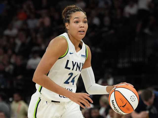 MINNEAPOLIS, MN - AUGUST 23: Napheesa Collier #24 of the Minnesota Lynx handles the ball during the game against the Las Vegas Aces on August 23, 2024 at Target Center in Minneapolis, Minnesota. Mandatory Copyright Notice: Copyright 2024 NBAE