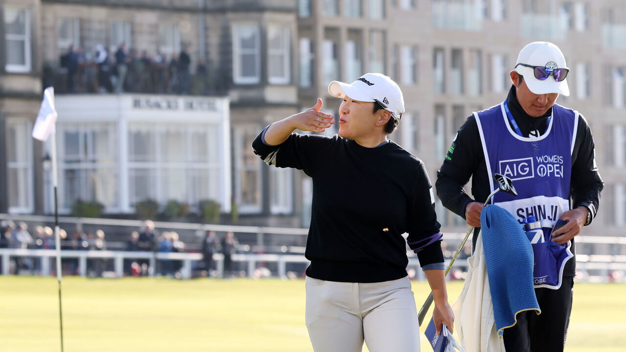 ST ANDREWS, SCOTLAND - AUGUST 24: Jiyai Shin of South Korea acknowledges the crowd on the 18th green during Day Three of the AIG Women's Open at St Andrews Old Course on August 24, 2024 in St Andrews, Scotland.