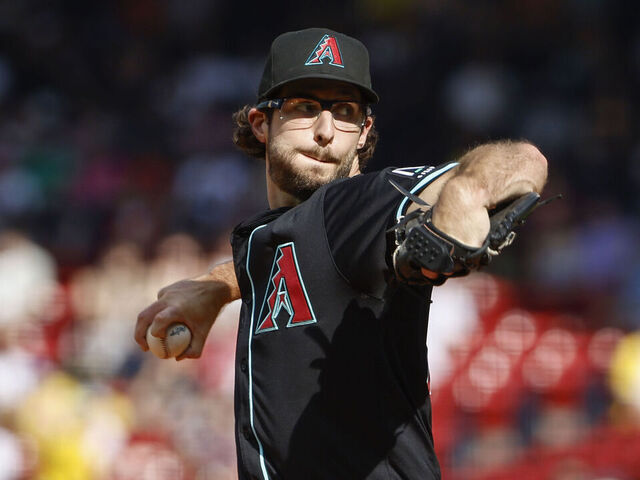 BOSTON, MA - AUGUST 24: Zac Gallen #23 of the Arizona Diamondbacks pitches against the Boston Red Sox during the first inning at Fenway Park on August 24, 2024 in Boston, Massachusetts.