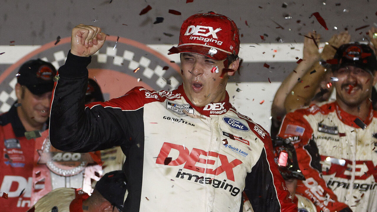 DAYTONA BEACH, FLORIDA - AUGUST 24: Harrison Burton, driver of the #21 DEX Imaging Ford, celebrates in victory lane after winning the NASCAR Cup Series Coke Zero Sugar 400 at Daytona International Speedway on August 24, 2024 in Daytona Beach, Florida.