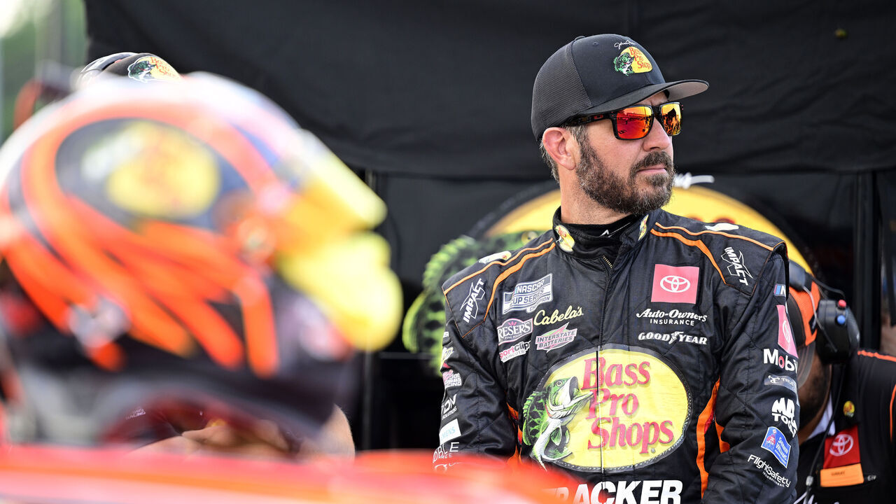 RICHMOND, VIRGINIA - AUGUST 10: Martin Truex Jr., driver of the #19 Bass Pro Shops Toyota, looks on during qualifying for the NASCAR Cup Series Cook Out 400 at Richmond Raceway on August 10, 2024 in Richmond, Virginia.