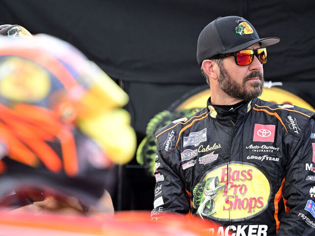 RICHMOND, VIRGINIA - AUGUST 10: Martin Truex Jr., driver of the #19 Bass Pro Shops Toyota, looks on during qualifying for the NASCAR Cup Series Cook Out 400 at Richmond Raceway on August 10, 2024 in Richmond, Virginia.