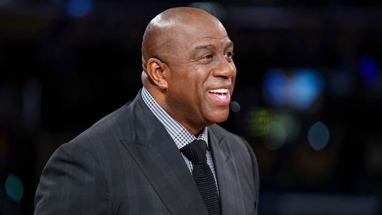 LOS ANGELES, CA - MARCH 5: ESPN Analyst, Magic Johnson looks on before the game between the Golden State Warriors and Los Angeles Lakers on March 5, 2022 at Crypto.Com Arena in Los Angeles, California. NOTE TO USER: User expressly acknowledges and agrees that, by downloading and/or using this Photograph, user is consenting to the terms and conditions of the Getty Images License Agreement. Mandatory Copyright Notice: Copyright 2022 NBAE