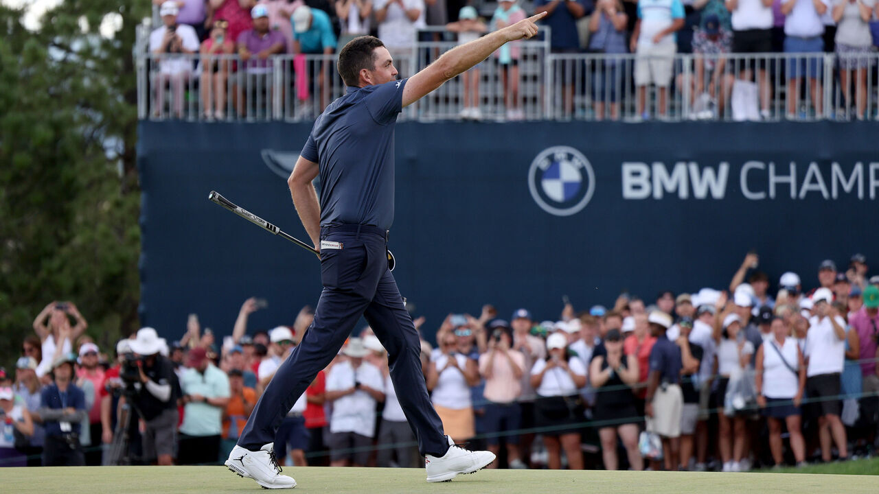 CASTLE ROCK, COLORADO - AUGUST 25: Keegan Bradley of the United States celebrates on the 18th green after winning the BMW Championship at Castle Pines Golf Club on August 25, 2024 in Castle Rock, Colorado.