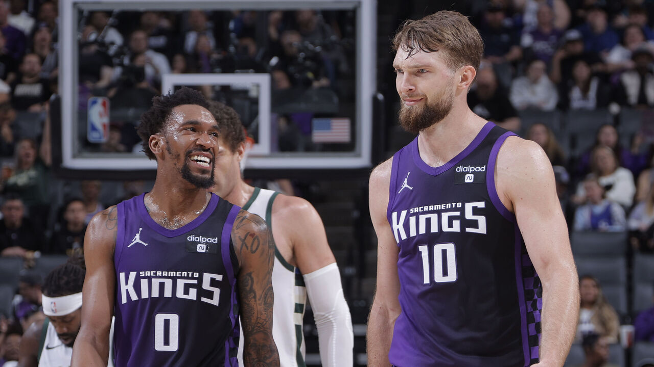 SACRAMENTO, CA - MARCH 12: Malik Monk #0 and Domantas Sabonis #10 of the Sacramento Kings talk during the game against the Milwaukee Bucks on March 12, 2024 at Golden 1 Center in Sacramento, California. NOTE TO USER: User expressly acknowledges and agrees that, by downloading and or using this photograph, User is consenting to the terms and conditions of the Getty Images Agreement. Mandatory Copyright Notice: Copyright 2024 NBAE