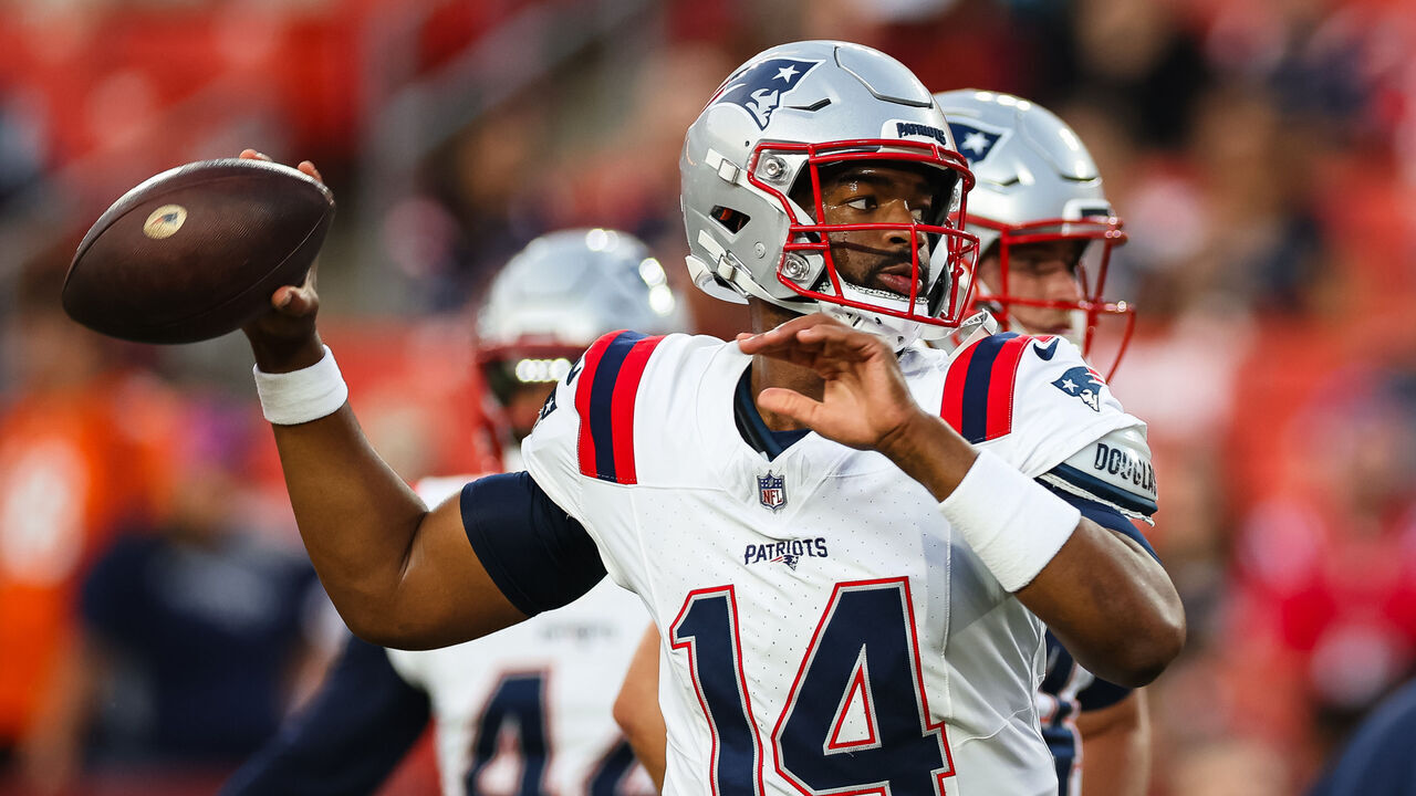 LANDOVER, MD - AUGUST 25: Jacoby Brissett #14 of the New England Patriots warms up before the preseason game against the Washington Commanders at Commanders Field on August 25, 2024 in Landover, Maryland.