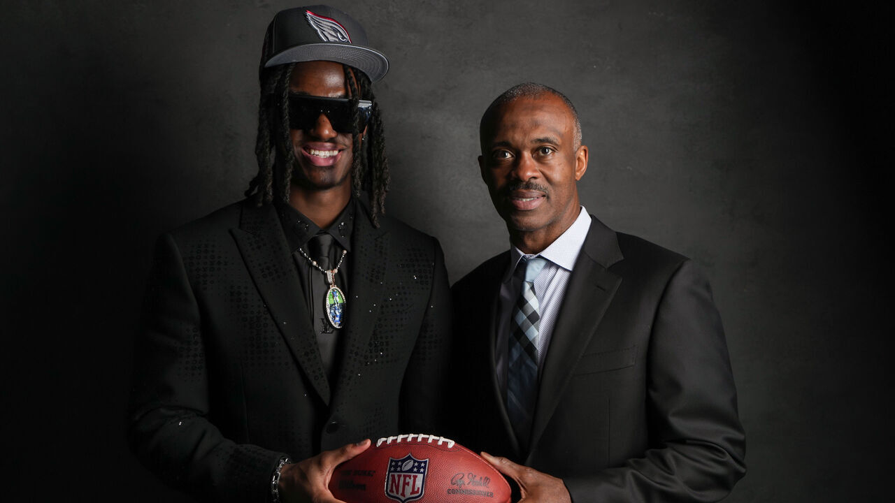 DETROIT, MI - APRIL 25: Wide receiver Marvin Harrison Jr. poses for portraits with his father, and former Indianapolis Colts wide receiver Marvin Harrison after being selected fourth overall in the first round by the Arizona Cardinals during the 2024 NFL draft on April 25, 2024 in Detroit, Michigan.