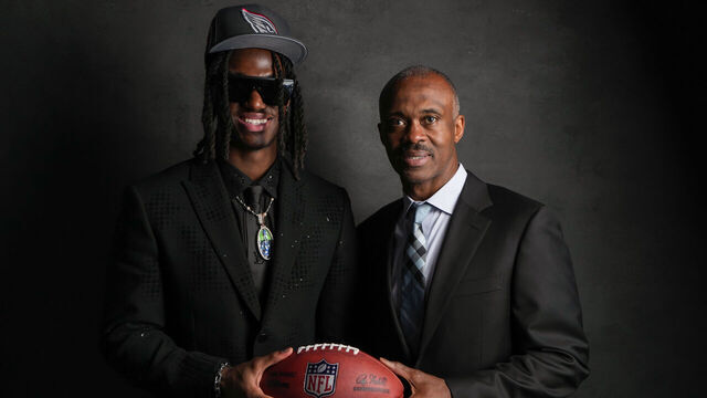 DETROIT, MI - APRIL 25: Wide receiver Marvin Harrison Jr. poses for portraits with his father, and former Indianapolis Colts wide receiver Marvin Harrison after being selected fourth overall in the first round by the Arizona Cardinals during the 2024 NFL draft on April 25, 2024 in Detroit, Michigan.