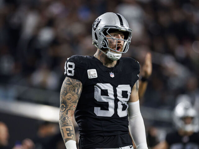 LAS VEGAS, NEVADA - DECEMBER 14: Maxx Crosby #98 of the Las Vegas Raiders celebrates during an NFL football game against the Los Angeles Chargers at Allegiant Stadium on December 14, 2023 in Las Vegas, Nevada.