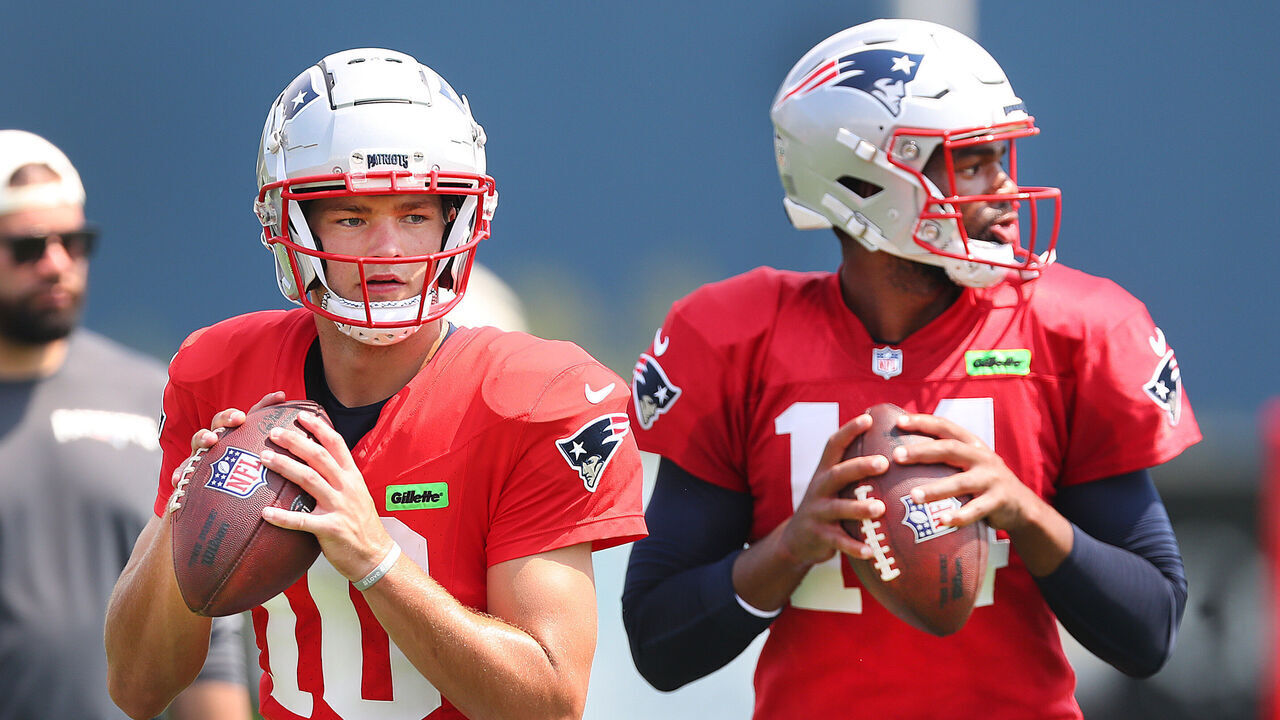 Foxborough, MA - August 2: New England Patriots QBs Drake Maye and Jacoby Brissett drop back during a drill.