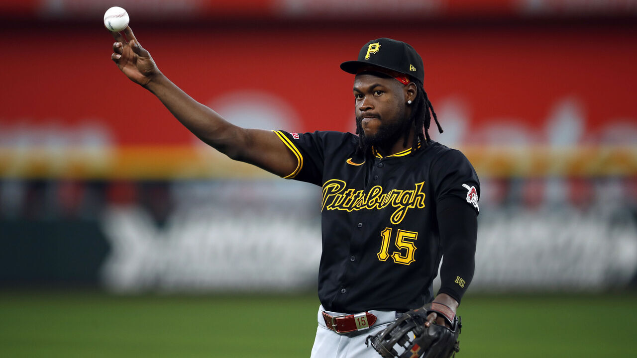 ARLINGTON, TX - AUGUST 21: Oneil Cruz #15 of the Pittsburgh Pirates warms up during batting practice prior to the game between the Pittsburgh Pirates and the Texas Rangers at Globe Life Field on Wednesday, August 21, 2024 in Arlington, Texas.