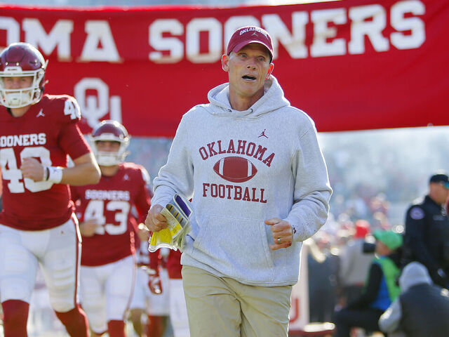 NORMAN, OKLAHOMA - NOVEMBER 24: Head coach Brent Venables of the Oklahoma Sooners runs onto the field for a game against the TCU Horned Frogs at Gaylord Family Oklahoma Memorial Stadium on November 24, 2023 in Norman, Oklahoma. Oklahoma won 69-45.