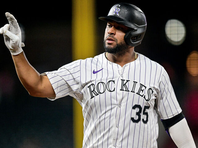 DENVER, COLORADO - AUGUST 6: Elias Diaz #35 of the Colorado Rockies celebrates his eighth inning run-scoring single against the New York Mets at Coors Field on August 6, 2024 in Denver, Colorado.