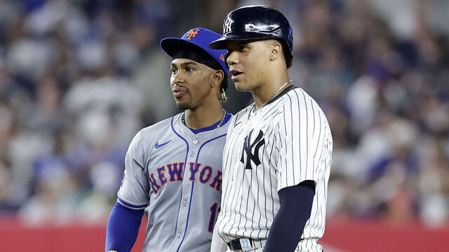 NEW YORK, NEW YORK - JULY 24: Juan Soto #22 of the New York Yankees stands at second base with Francisco Lindor #12 of the New York Mets during the fifth inning of their game at Yankee Stadium on July 24, 2024 in New York City.