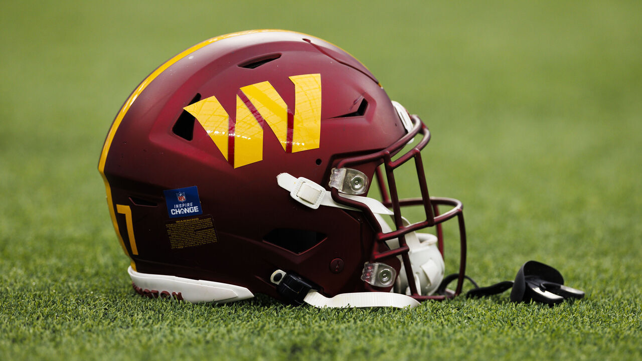 INGLEWOOD, CALIFORNIA - DECEMBER 17: A detail view of a Washington Commanders helmet on the field during a game against the Los Angeles Rams at SoFi Stadium on December 17, 2023 in Inglewood, California.
