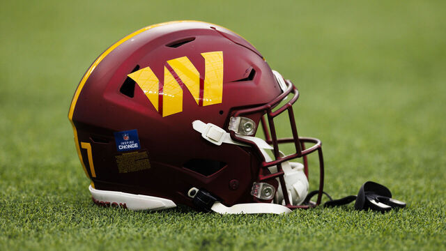 INGLEWOOD, CALIFORNIA - DECEMBER 17: A detail view of a Washington Commanders helmet on the field during a game against the Los Angeles Rams at SoFi Stadium on December 17, 2023 in Inglewood, California.
