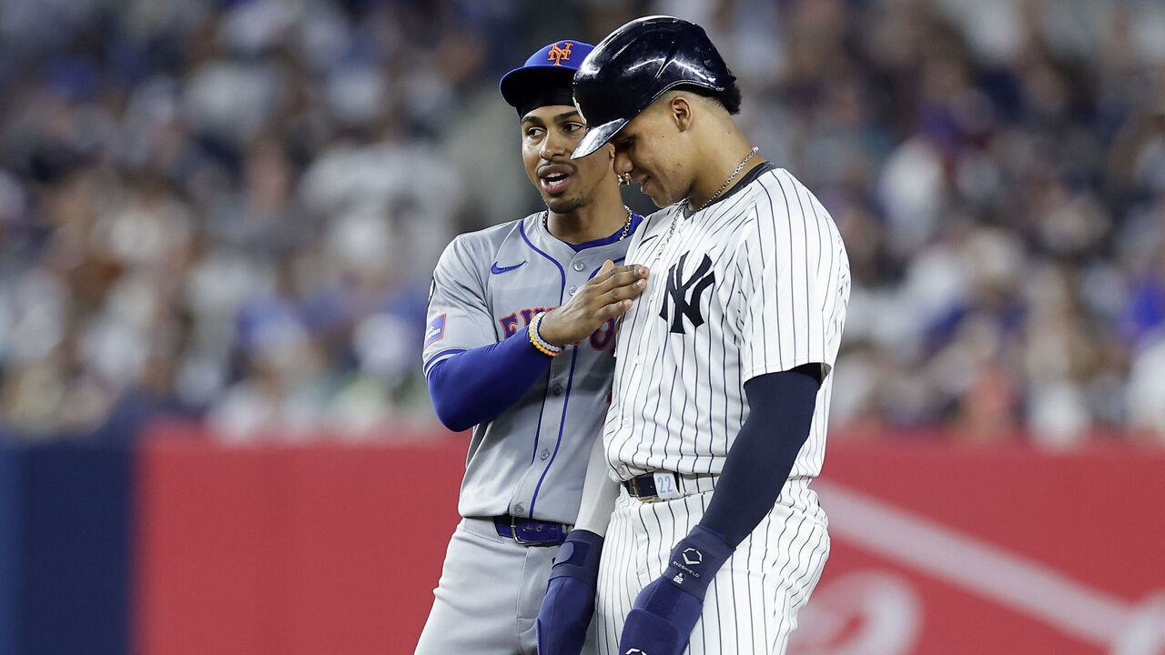 NEW YORK, NEW YORK - JULY 24: Juan Soto #22 of the New York Yankees stands at second base during the fifth inning with Francisco Lindor #12 of the New York Mets at Yankee Stadium on July 24, 2024 in New York City.