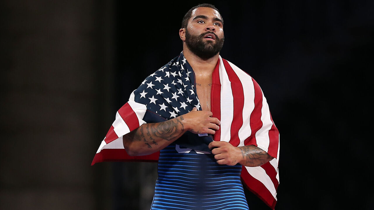 CHIBA, JAPAN - AUGUST 06: Gable Dan Stevenson (blue) of Team United States celebrates after winning the golden medal during the Men's Freestyle 125kg final in the Tokyo 2020 Olympic Games at Makuhari Messe Hall on August 06, 2021 in Chiba, Japan.