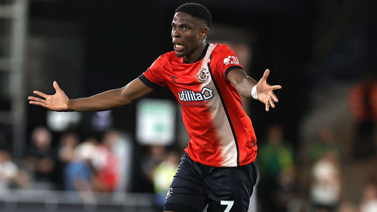 LUTON, ENGLAND - AUGUST 12: Chiedozie Ogbene of Luton Town pleads to the referee during the Sky Bet Championship match between Luton Town FC and Burnley FC at Kenilworth Road on August 12, 2024 in Luton, England.