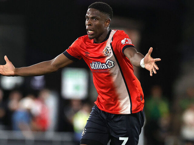 LUTON, ENGLAND - AUGUST 12: Chiedozie Ogbene of Luton Town pleads to the referee during the Sky Bet Championship match between Luton Town FC and Burnley FC at Kenilworth Road on August 12, 2024 in Luton, England.