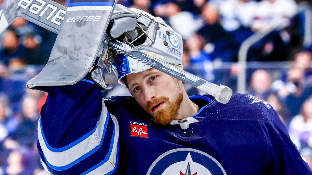 WINNIPEG, CANADA - JANUARY 11: Goaltender Laurent Brossoit #39 of the Winnipeg Jets looks on during a third period stoppage in play against the Chicago Blackhawks at the Canada Life Centre on January 11, 2024 in Winnipeg, Manitoba, Canada.