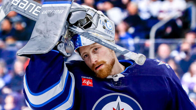 WINNIPEG, CANADA - JANUARY 11: Goaltender Laurent Brossoit #39 of the Winnipeg Jets looks on during a third period stoppage in play against the Chicago Blackhawks at the Canada Life Centre on January 11, 2024 in Winnipeg, Manitoba, Canada.