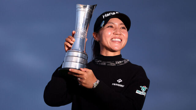 ST ANDREWS, SCOTLAND - AUGUST 25: Champion, Lydia Ko of New Zealand poses with the AIG Women's Open trophy following victory on Day Four of the AIG Women's Open at St Andrews Old Course on August 25, 2024 in St Andrews, Scotland.