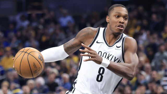 INDIANAPOLIS, INDIANA - MARCH 16: Lonnie Walker IV #8 of the Brooklyn Nets drives to the basket in the game against the Indiana Pacers at Gainbridge Fieldhouse on March 16, 2024 in Indianapolis, Indiana.