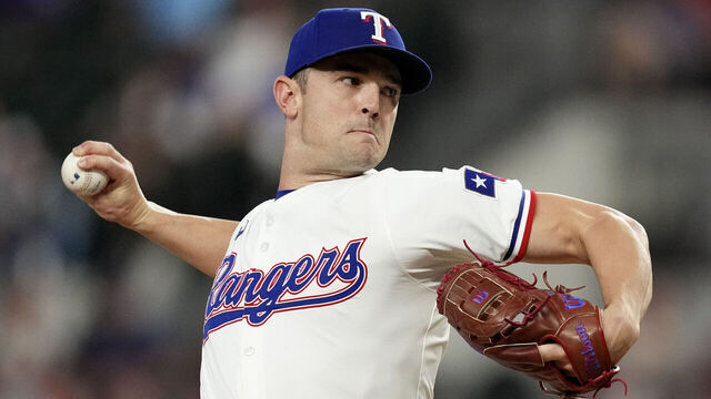 ARLINGTON, TEXAS - AUGUST 21: David Robertson #37 of the Texas Rangers pitches during the eighth inning against the Pittsburgh Pirates at Globe Life Field on August 21, 2024 in Arlington, Texas.